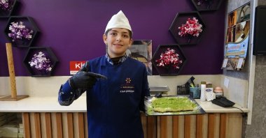 Ahmet prepares katmer at a workshop, training to carry the traditional craft he learned in Türkiye back to Syria, Kilis, Türkiye, Jan. 5, 2025. (IHA Photo)