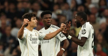 Real Madrid's Gonzalo Garcia (L) celebrates with his teammates Aurelien Tchouameni (C) and Antonio Rudiger during the La Liga match against Real Betis at the Bernabeu, Madrid, Spain, Jan. 4, 2026. (Reuters Photo)
