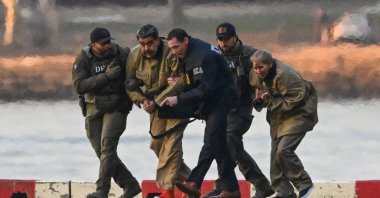 Captured Venezuelan President Nicolas Maduro and his wife, Cilia Flores, arrive at the Wall Street Heliport during their transport to the federal courthouse for their arraignment in New York, New York, U.S., Jan. 5, 2026. (EPA Photo)