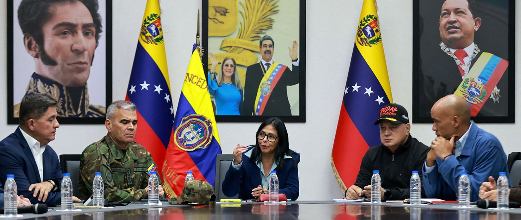 This handout picture released by the Miraflores Palace press office shows Venezuela's Vice-President Delcy Rodriguez (C) speaking next to Venezuelan Defense Minister Vladimir Padrino Lopez (2nd-L) and Venezuela's Minister of Interior Relations, Justice, and Peace, Diosdado Cabello (2nd-R) during a council of ministers meeting at the Vice Presidency headquarters in Caracas on January 4, 2026. (AFP Photo)