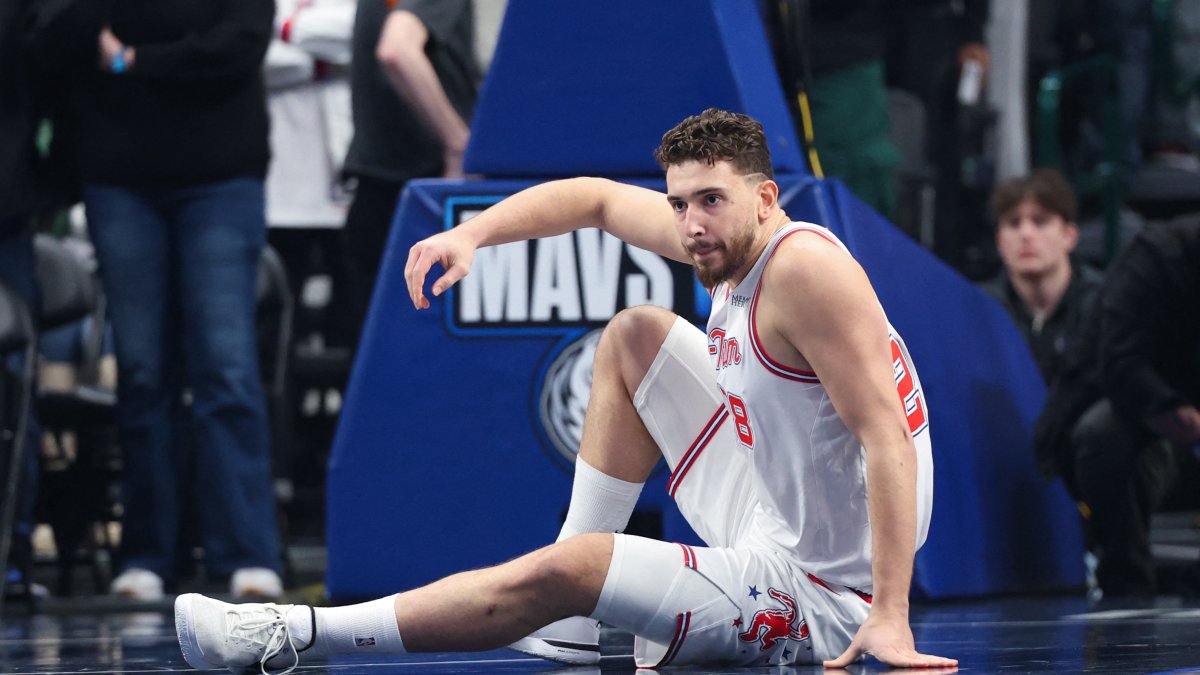 Houston Rockets' Alperen Şengün lies injured during the first quarter against the Dallas Mavericks at American Airlines Center, Dallas, U.S., Jan. 3, 2026: (Reuters Photo)