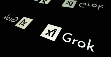 Screens displaying the logo of Grok, Toulouse, France, Jan. 15, 2025. (AFP Photo)