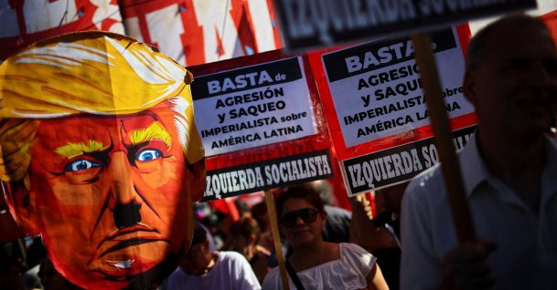 A demonstrator holds a cardboard depiction of U.S. President Donald Trump outside the U.S. Embassy during a protest following the U.S. attack on Venezuela, Buenos Aires, Argentina, Jan. 5, 2026. (Reuters Photo)