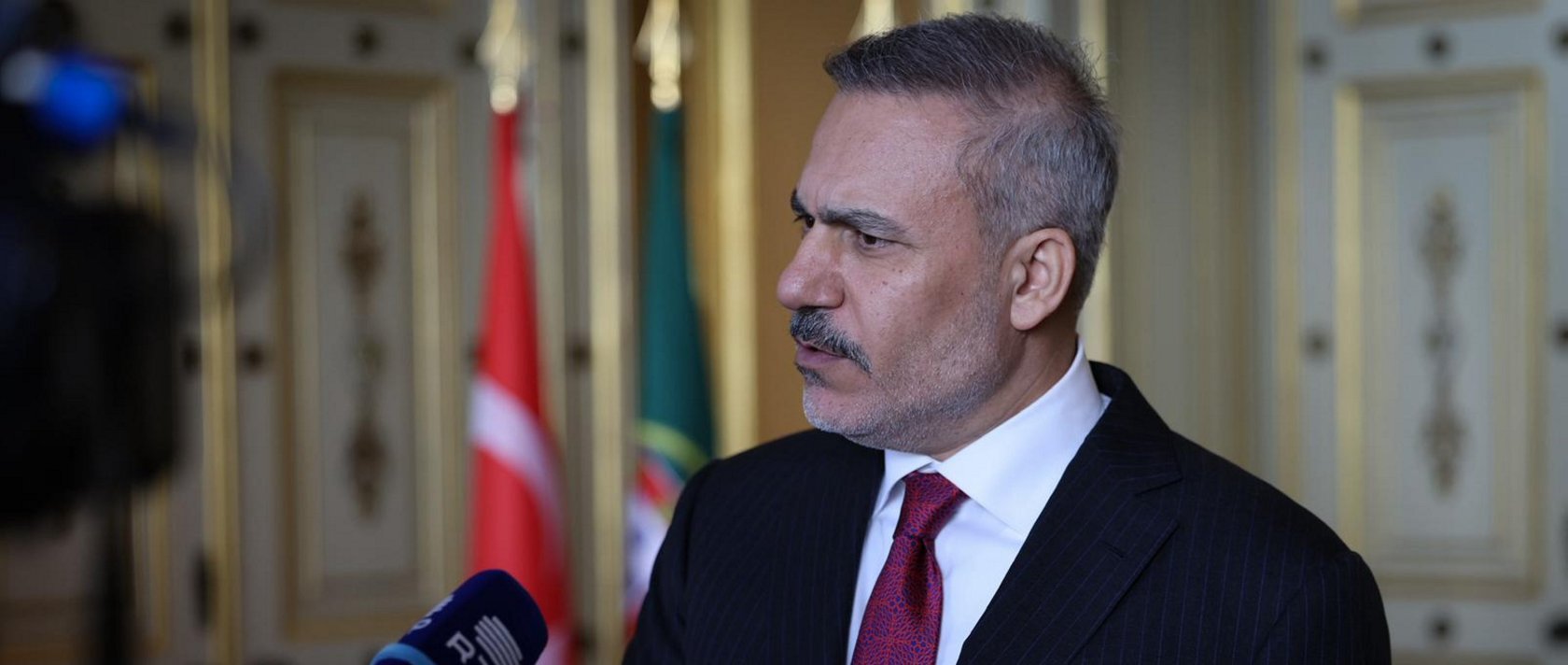 Foreign Minister Hakan Fidan speaks at an interview with Portugal's RTP, Lisbon, Portugal, Jan. 6, 2025. (AA Photo)