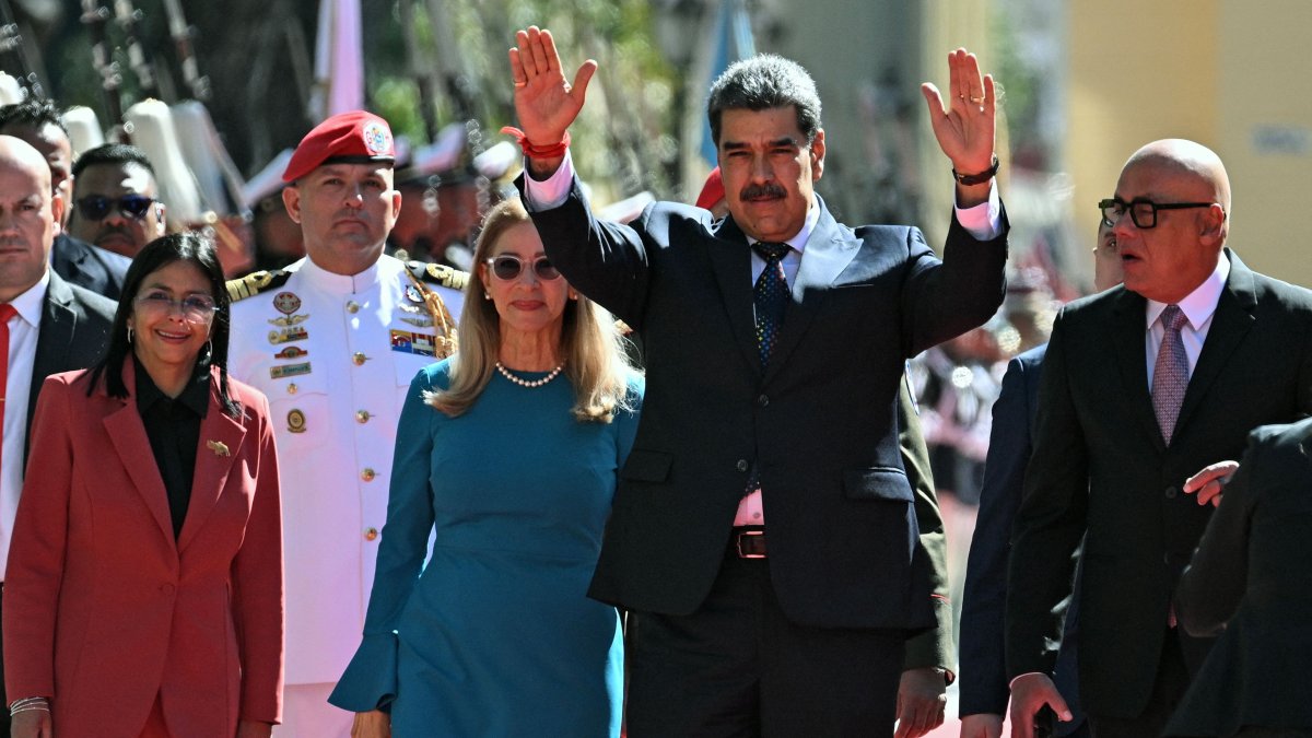 President Nicolas Maduro (2nd R) waves next to first lady Cilia Flores, Vice President Delcy Rodriguez (L) and National Assembly president, Jorge Rodriguez, Caracas, Venezuela, Jan. 10, 2025. (AFP Photo)