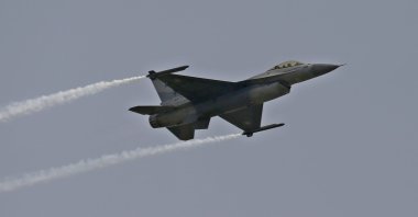 A Pakistani Air Force JF-17 fighter jet flies over during a military parade to mark Pakistan National Day in Islamabad, Pakistan, March 23, 2022. (AP Photo)
