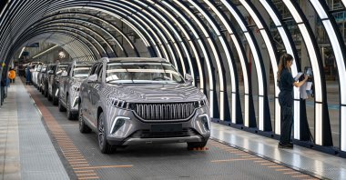 Employees work on a car assembly line at a factory of Turkish EV manufacturer Togg, Bursa, northwestern Türkiye, May 17, 2024. (AFP Photo)
