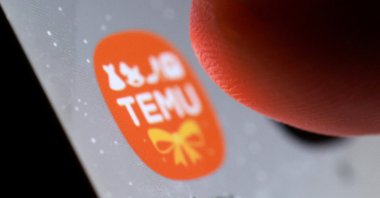 The Temu app icon is seen on a smartphone in this illustration taken on Oct. 27, 2025. (Reuters Photo)