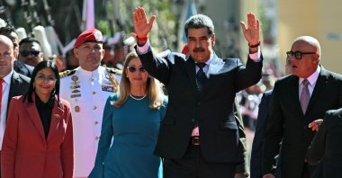 President Nicolas Maduro (2nd R) waves next to first lady Cilia Flores, Vice President Delcy Rodriguez (L) and National Assembly president, Jorge Rodriguez, Caracas, Venezuela, Jan. 10, 2025. (AFP Photo)
