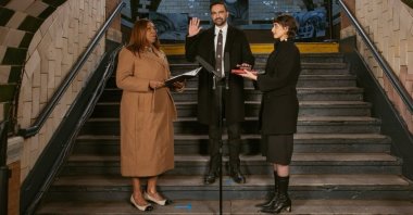 New York mayor-elect Zohran Mamdani (C) places his hand on a Quran as he is sworn in by New York Attorney General Letitia James (L) and his wife Rama Duwaji looks on in New York, Jan. 1, 2026. (Zohran Mamdani on Facebook)
