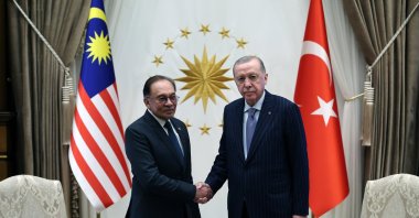 President Recep Tayyip Erdoğan and Malaysian Prime Minister Anwar Ibrahim shake hands as they meet at the Presidential Complex in Ankara, Jan. 7, 2026. (AA Photo)
