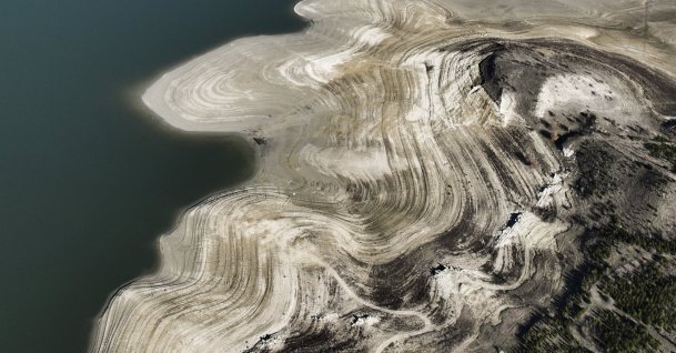 A drone-captured aerial view shows the Çamlıdere Dam, where experts are working to reduce water loss and leakage, Ankara, Türkiye, Dec. 17, 2025. (AA Photo)