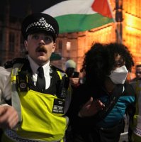A pro-Palestinian demonstrator is arrested by police during a protest in London, U.K., Oct. 2, 2025. (AP Photo)