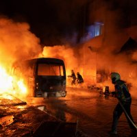 Members of the Syrian Civil Defence work to extinguish a fire after shelling amid renewed clashes between the Syrian army and SDF in Aleppo, Syria, Jan. 8, 2026. (Reuters Photo)