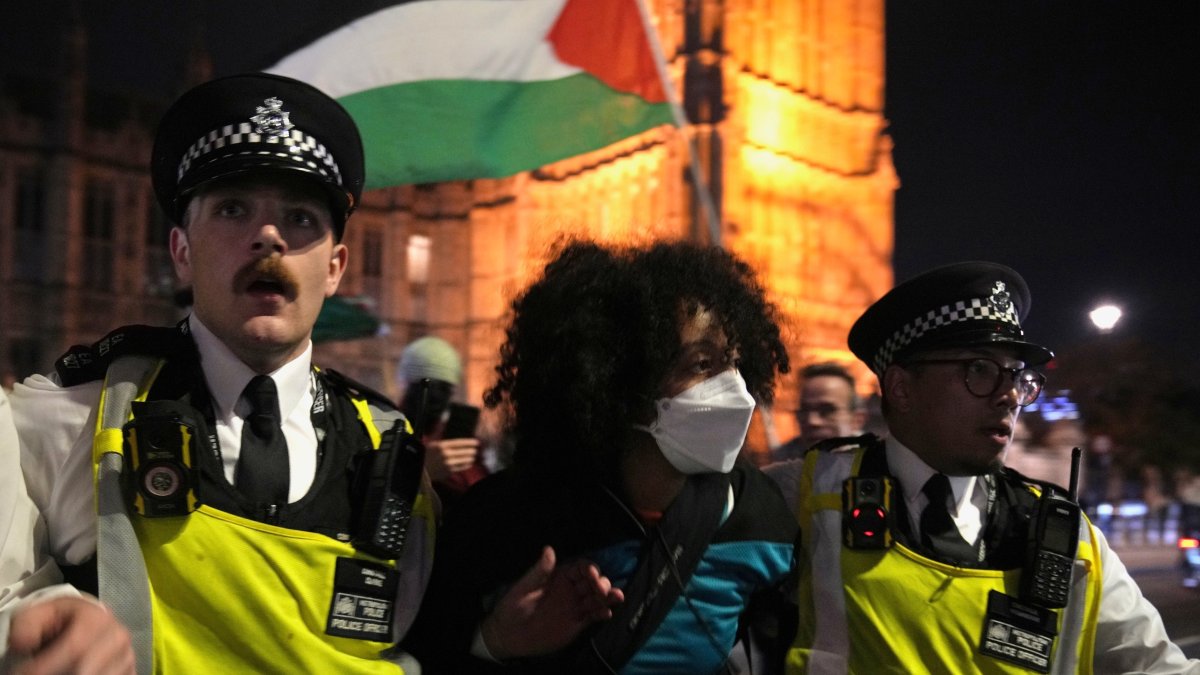 A pro-Palestinian demonstrator is arrested by police during a protest in London, U.K., Oct. 2, 2025. (AP Photo)