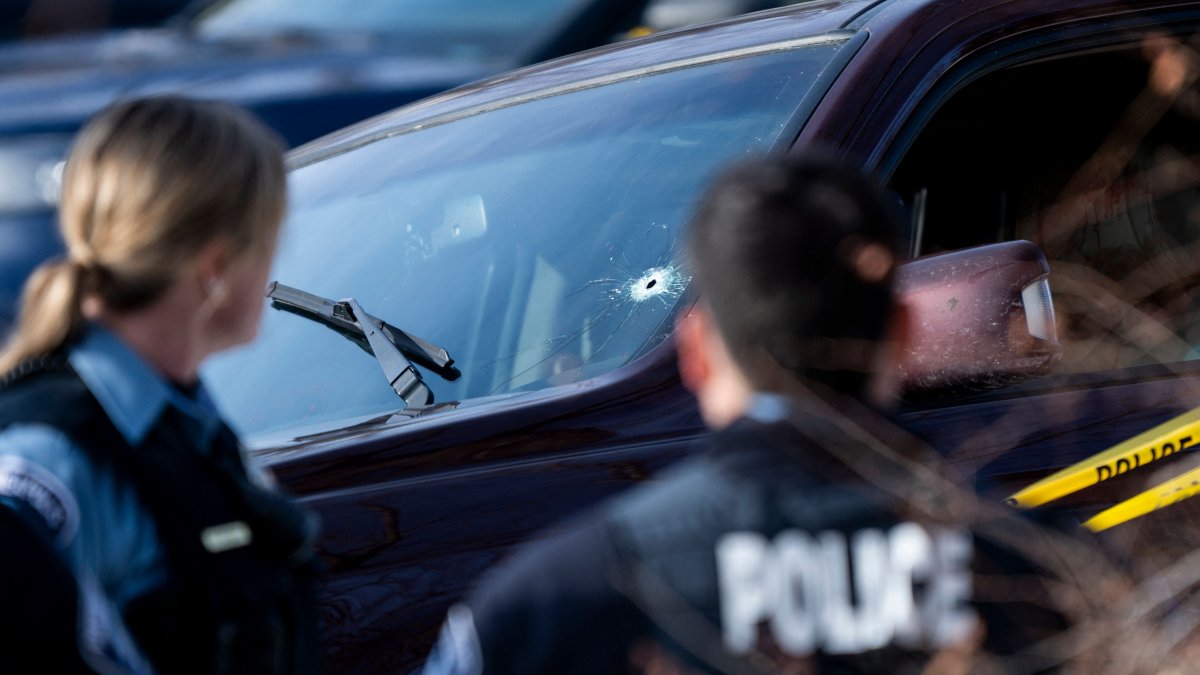 A bullet hole is seen in the windshield of a vehicle involved in a shooting by an ICE agent during federal law enforcement operations, Minneapolis, Minnesota, U.S., Jan. 7, 2026. (AFP Photo) 