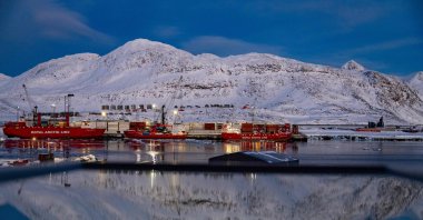 The port and the mountain behind are reflected in a window, Nuuk, Greenland, March 7, 2025. (AFP Photo)