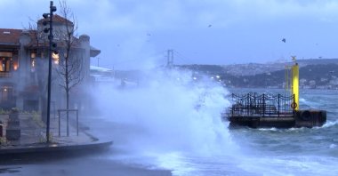 Waves crash into the port in Beşiktaş after public transportation was suspended due to a storm in Istanbul, Türkiye, Jan. 8, 2025. (DHA Photo)