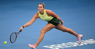 Belarus' Aryna Sabalenka hits a return during her women's singles match against Romania's Sorana Cirstea at the Brisbane International tennis tournament, Brisbane, Australia, Jan. 8, 2026. (AFP Photo)
