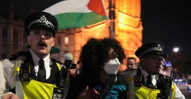 A pro-Palestinian demonstrator is arrested by police during a protest in London, U.K., Oct. 2, 2025. (AP Photo)
