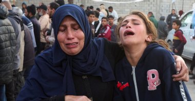 Mourners react as they attend the funeral of a Palestinian who was killed in an Israeli strike, at Nasser Hospital, in Khan Younis, in the southern Gaza Strip, Jan. 8, 2026. (Reuters Photo)