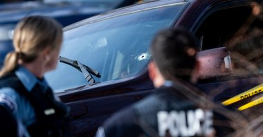 A bullet hole is seen in the windshield of a vehicle involved in a shooting by an ICE agent during federal law enforcement operations, Minneapolis, Minnesota, U.S., Jan. 7, 2026. (AFP Photo) 