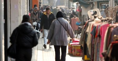 Iranians walk on a street in Tehran, Iran, Jan. 8, 2026. (EPA Photo)