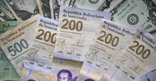 A picture of Venezuelan bolivar and dollar bills taken in Caracas, Venezuela, Sept. 30, 2025. (AFP Photo)
