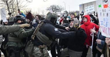 Protestors clash with federal agents outside the Bishop Henry Whipple Federal Building, Saint Paul, U.S., Jan. 8, 2026. (AFP Photo)