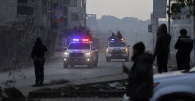 Syrian military police travel in vehicles, after the PKK/YPG terrorist group made an agreement with the Syrian government to depart and evacuate to northeastern Syria after days of fighting with the Syrian army, Aleppo, Syria, Jan. 9, 2026. (Reuters Photo)