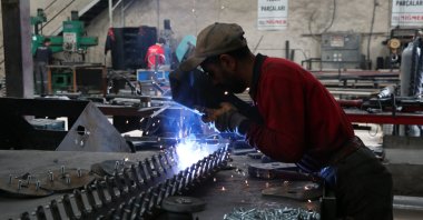 A worker is seen at a factory manufacturing agricultural equipment in Niğde province, central Türkiye, June 3, 2020. (AA Photo)