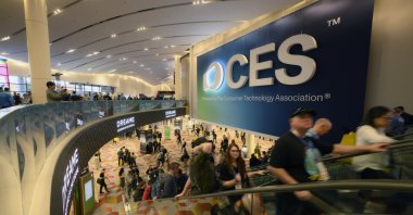 Attendees pass by a CES sign during CES 2026, an annual consumer electronics trade show, Las Vegas, Nevada, U.S., January 7, 2026. (AA Photo)