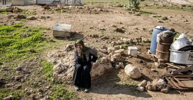  A woman cries as her family packs their belongings and leaves their home after months of harassment from a nearby illegal Israeli settler outpost in Ras Ein al-Auja, near Jericho in the Israel-occupied Palestinian West Bank, Jan. 8, 2026. (AFP Photo)