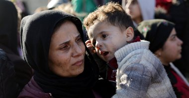 People evacuate from Sheikh Maksoud neighborhood following clashes between the Syrian government and the PKK/YPG, in Aleppo, Syria, Jan. 10, 2026. (Reuters Photo)