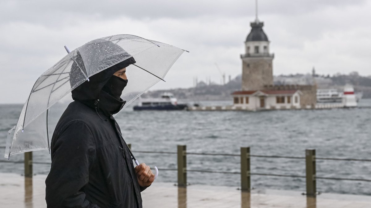 A man walks along the shore during a rainstorm in Üsküdar district, Istanbul, Türkiye, Jan. 11, 2026. (AA Photo)