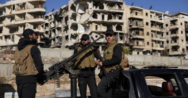 Members of the general security forces patrol the Sheikh Maksoud neighbourhood after taking control of the area, following the YPG attacks, Aleppo, Syria, Jan. 10, 2026. (Reuters Photo)
