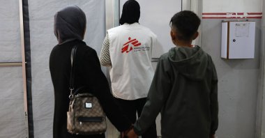 Patients follow a member of staff at a Medecins Sans Frontieres (MSF) clinic, in the al-Rimal neighborhood of Gaza City, Palestine, Dec. 31, 2025. (AFP Photo)