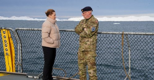 Denmark's Prime Minister Mette Frederiksen talks with the head of the Arctic Command Soeren Andersen, aboard the Defense's inspection vessel Vaedderen in the waters around Nuuk, Greenland, April 3, 2025.  (Reuters Photo)
