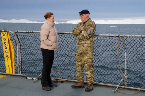 Denmark's Prime Minister Mette Frederiksen talks with the head of the Arctic Command Soeren Andersen, aboard the Defense's inspection vessel Vaedderen in the waters around Nuuk, Greenland, April 3, 2025.  (Reuters Photo)