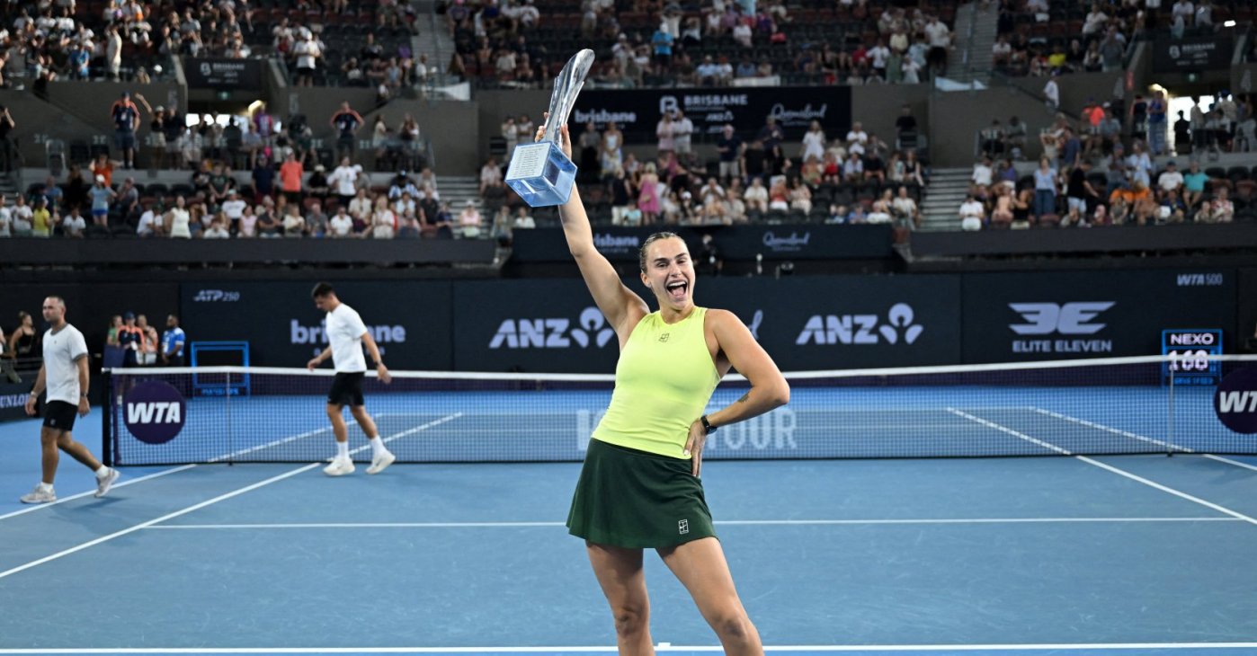 Belarus' Aryna Sabalenka celebrates with the trophy after winning the final against Ukraine's Marta Kostyuk, Brisbane, Australia, Jan. 11, 2026. (Reuters Photo)