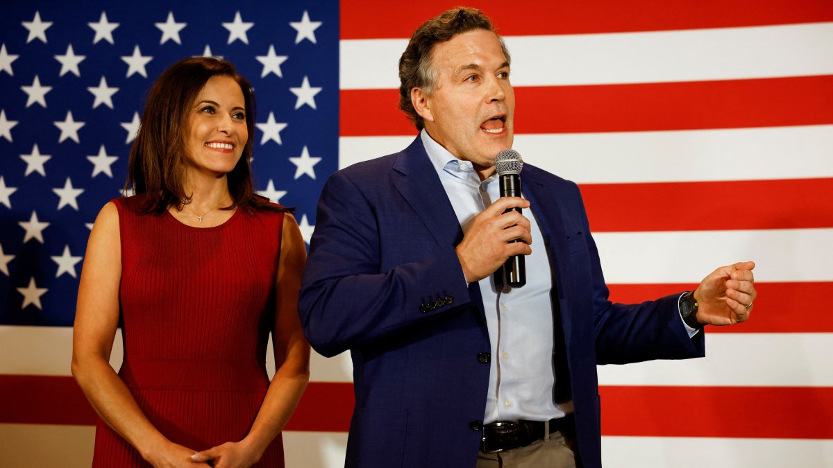Republican Party U.S. Senate candidate David McCormick speaks to supporters alongside his wife, Dina Powell McCormick, at an election night event in Pittsburgh, Pennsylvania, U.S. May 17, 2022. (Reuters Photo)