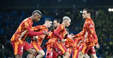 Galatasaray players warm up before the Super Cup final match against Fenerbahçe at the Atatürk Olympic Stadium, Istanbul, Türkiye, Jan. 10, 2025. (AA Photo)