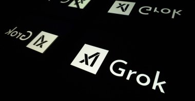 This photograph shows screens displaying the logo of Grok, a generative artificial intelligence chatbot developed by U.S. artificial intelligence company xAI, in Toulouse, southern France, Jan. 15, 2025. (AFP Photo)