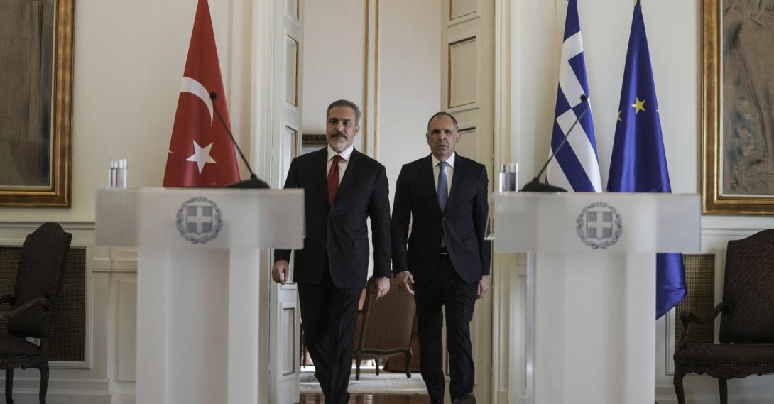 Greek Foreign Minister George Gerapetritis (R) and his Turkish counterpart Hakan Fidan arrive for a joint news conference, Athens, Greece, Nov. 8, 2024. (AP Photo)