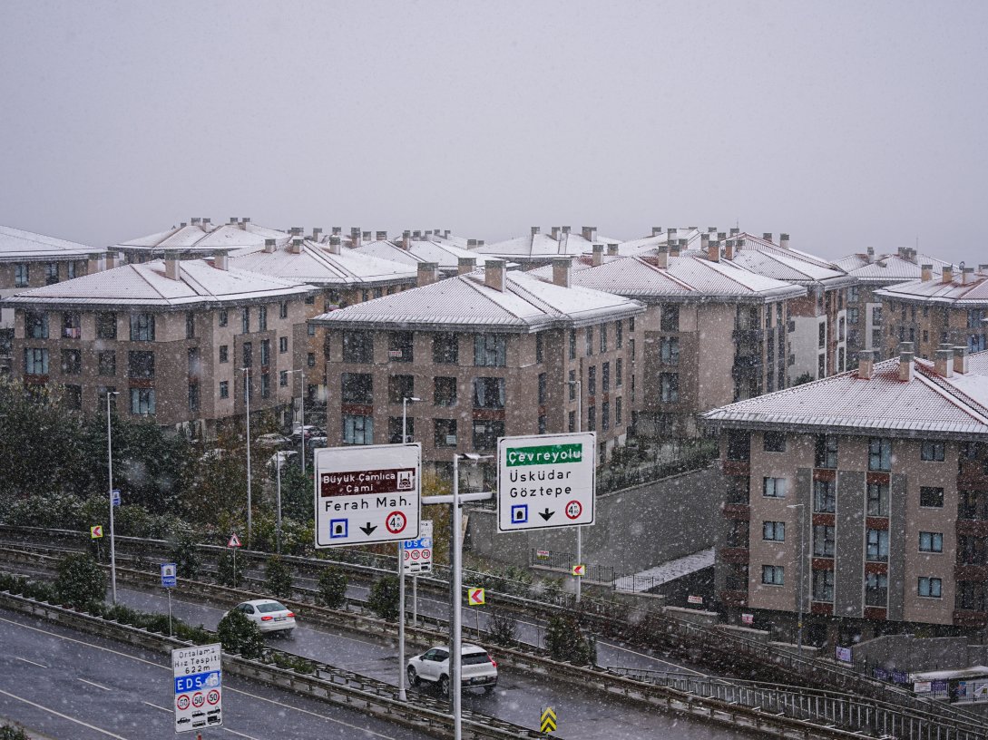Buildings on the Asian side are covered by snowfall as the precipitation remains effective, Istanbul, Türkiye, Jan. 12, 2025. (AA Photo)