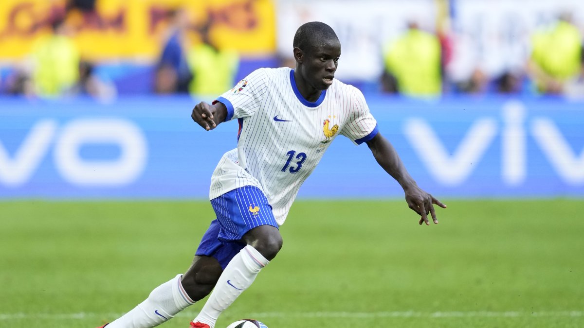 France's N'Golo Kante runs with the ball during a round of sixteen match between France and Belgium at the Euro 2024 tournament, Duesseldorf, Germany, July 1, 2024. (AP Photo)