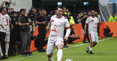 Former footballer Mesut Özil takes part in a show match during the launch event of the “GENÇLİG 2026” Inter-High School Football Tournament, organized by the Türkiye Youth Foundation (TÜGVA), at Volkswagen Arena, Istanbul, Türkiye, Jan. 12, 2026. (AA Photo)
