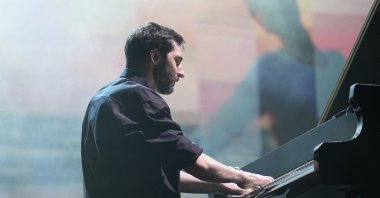 Minimalist pianist Evgeny Grinko performs on stage, Istanbul, Türkiye, Aug. 23, 2024. (Shutterstock Photo)