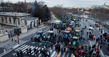 Tractors line up as French farmers protest against the EU-Mercosur free trade agreement and the French government's agricultural policy, Paris, France, Jan. 13, 2026. (Reuters Photo)
