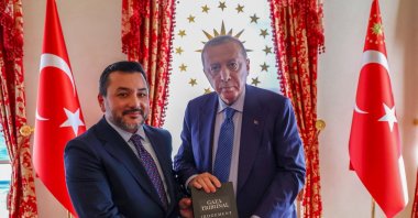 ICYF President Taha Ayhan (L) presented the judgement of Gaza Tribunal to President Erdoğan in Istanbul, Türkiye, Jan. 9, 2026. (Courtesy of ICYF) 